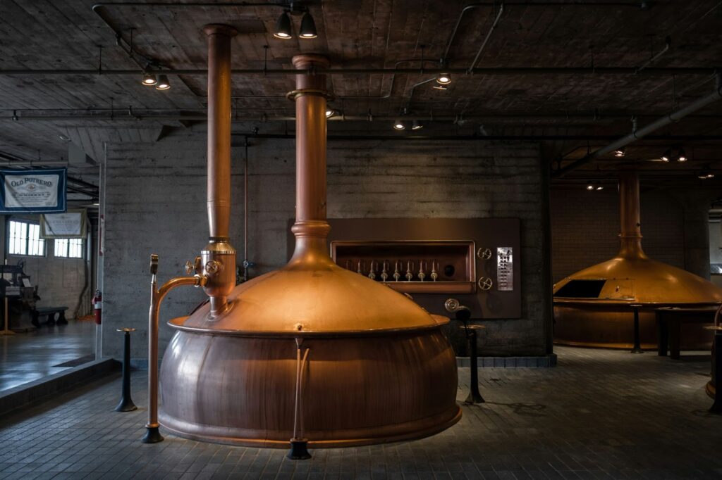 Interior of a brewery with tanks.