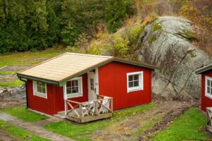 Cute Red Shome Metal Building with Green Space.